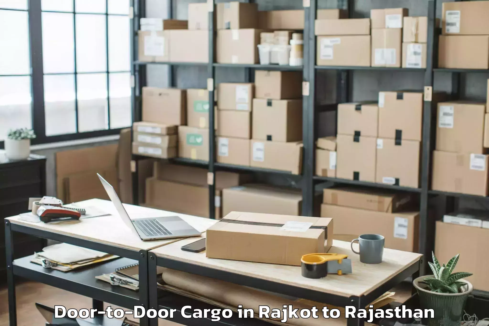 Expert Rajkot to Singhania University Jhunjhunu Door To Door Cargo